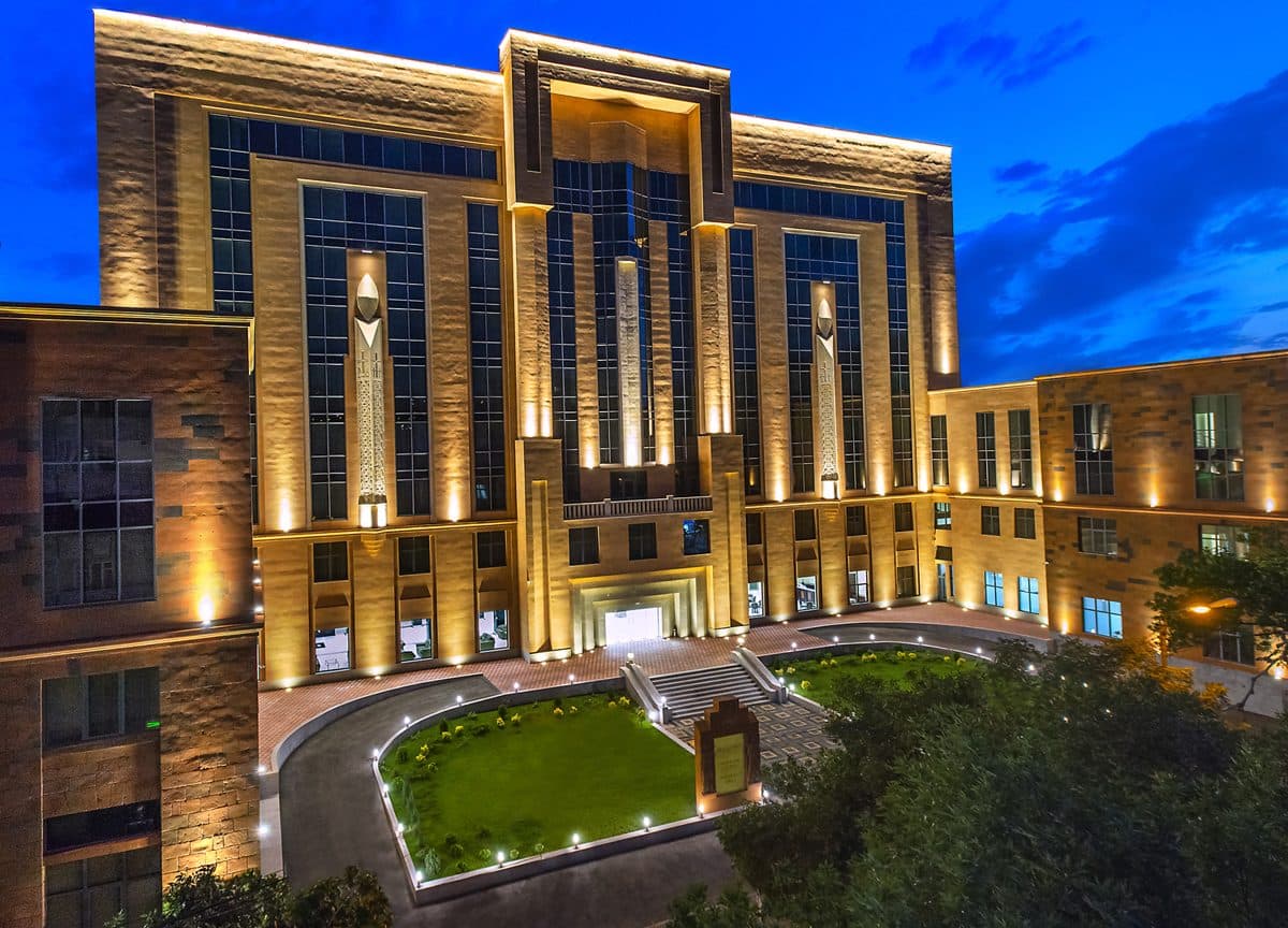 Ani Grand Hotel facade lit at dusk